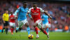 découvrez comment la stratégie innovante de mikel arteta a permis à arsenal, avec un trossard inspiré, de résister à la pression de manchester city et d'un doku frustré lors des toutes dernières minutes du match.